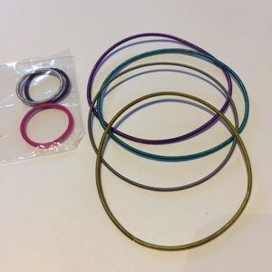 NWOT Set of Stretchy Metal Bracelets and Rings